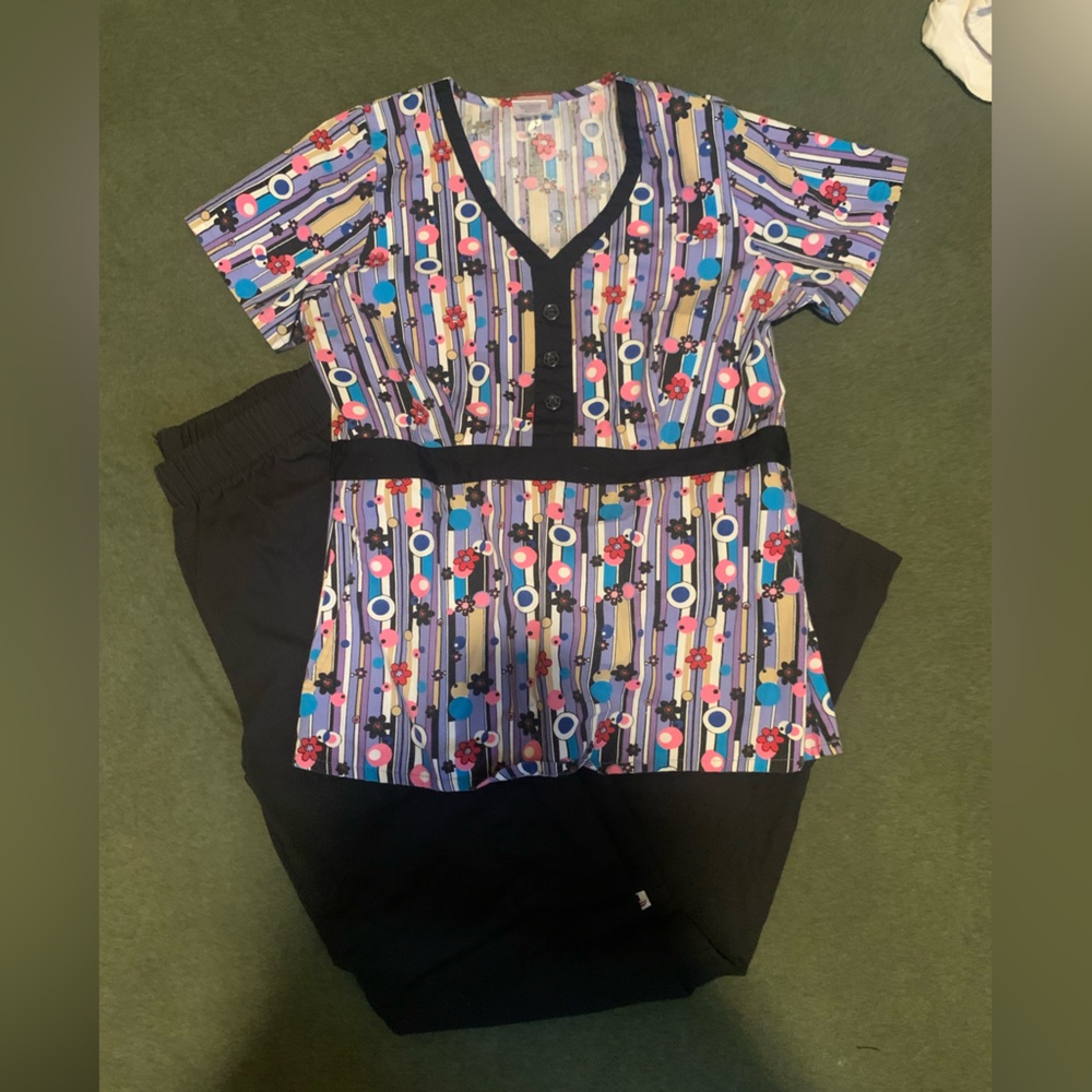 scrub top with cute design and in good condition